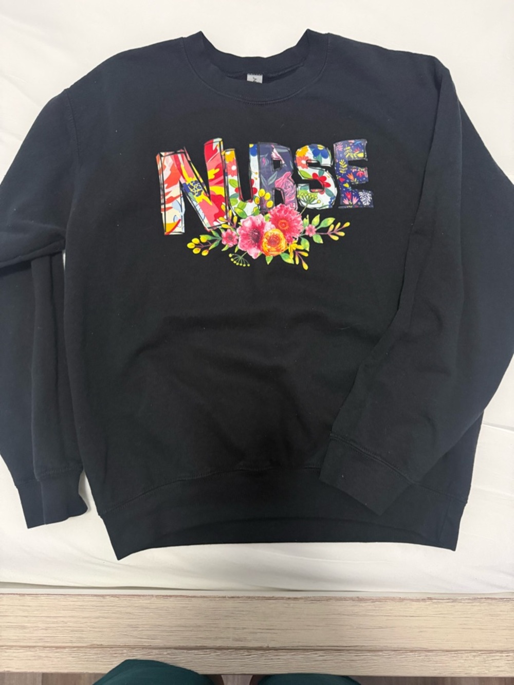 Gildan Black Crewneck Sweatshirt with Colorful 'NURSE' Floral Graphic